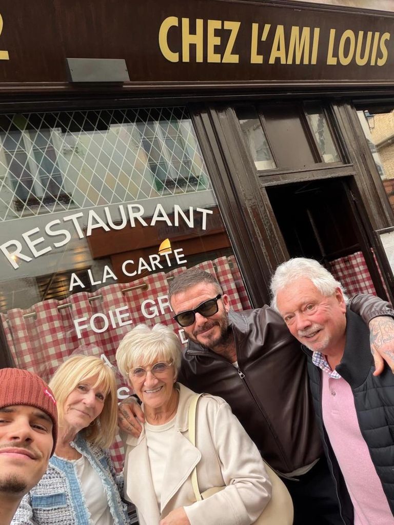 David Beckham posing with 'Nanny Sandra' and Victoria's parents, plus Romeo  Beckham