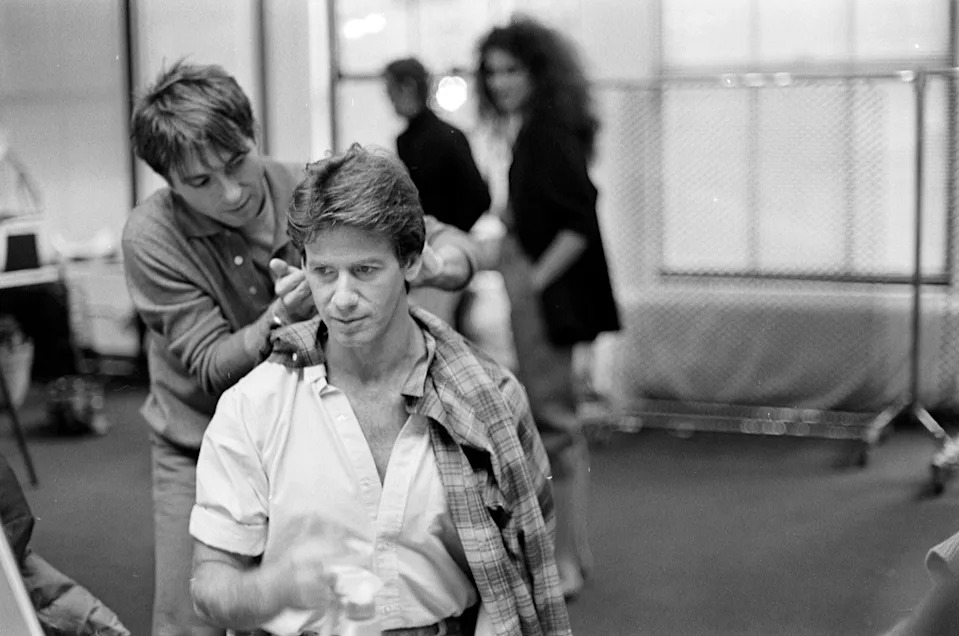 Designer Calvin Klein gets a haircut in his New York design studio and showroom.