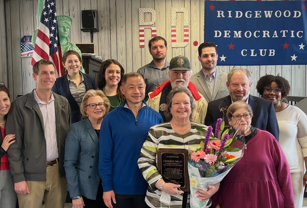 Assemblymember Ed Braunstein with former Assemblywoman Catherine Nolan as she was honored at a meeting of the Ridgewood Democratic Club in 2022. 
