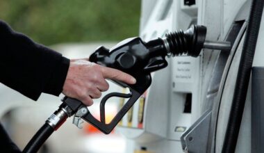 A Shell gas station customer pumps gas in Menlo Park, Calif. (AP Photo/Paul Sakuma)