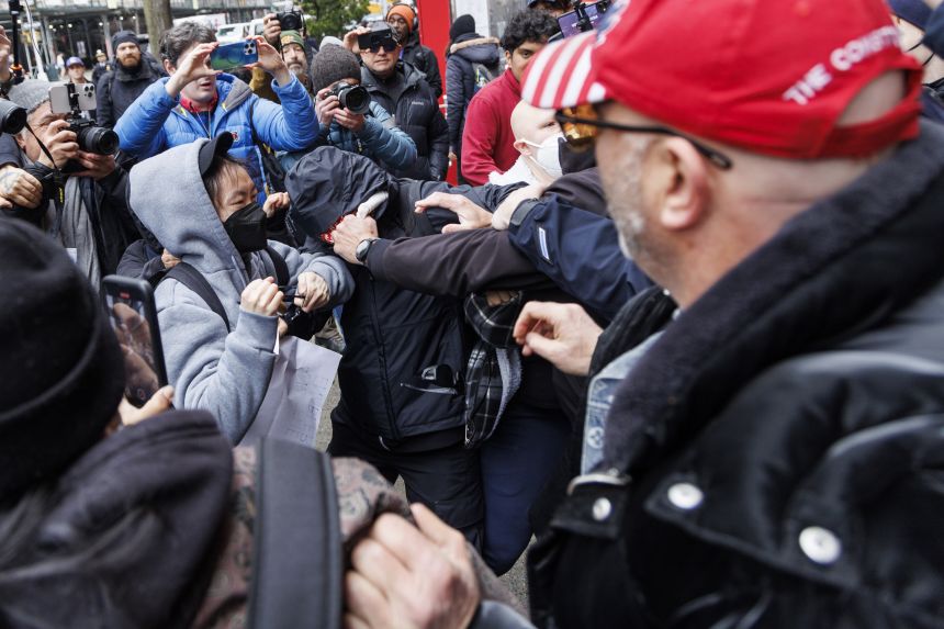 Two groups of protesters clashed outside Gracie Mansion on Saturday.