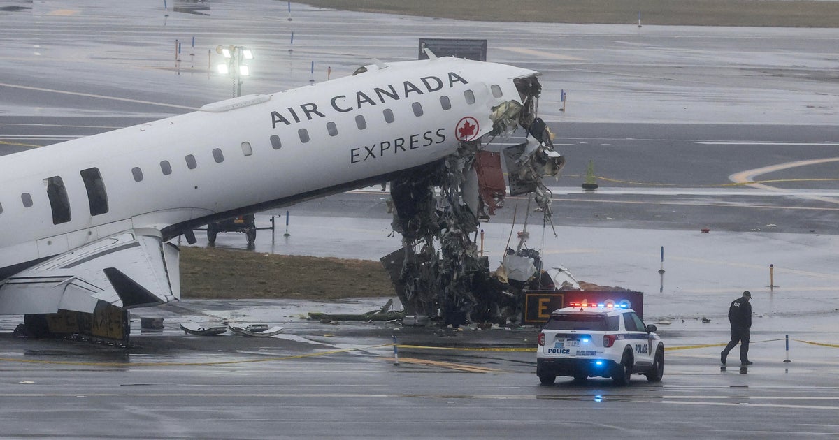 LaGuardia Airport runway crash investigators arriving on scene in NYC