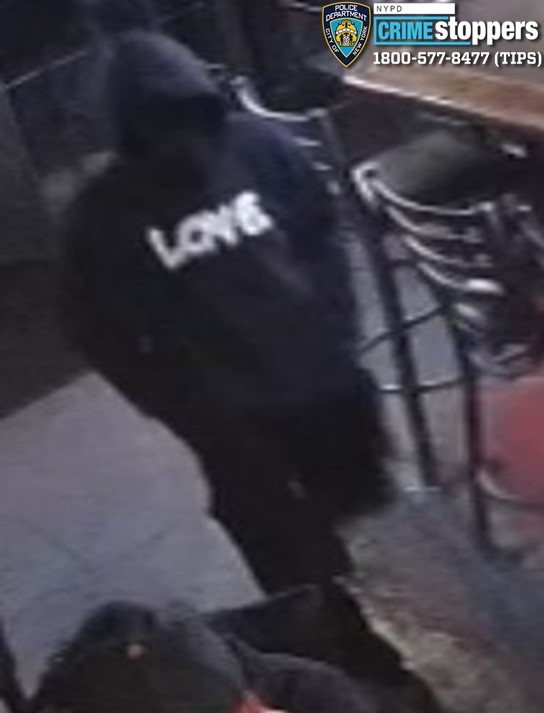 The NYPD released surveillance images of the two masked gunmen and are asking for the public's help in identifying them.