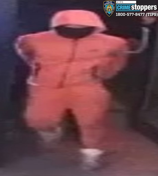 The NYPD released surveillance images of the two masked gunmen and are asking for the public's help in identifying them.