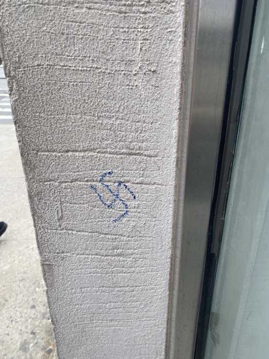 swastika drawn on a building in Brooklyn 