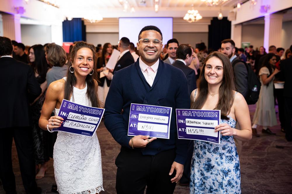 Three students reveal their matches.