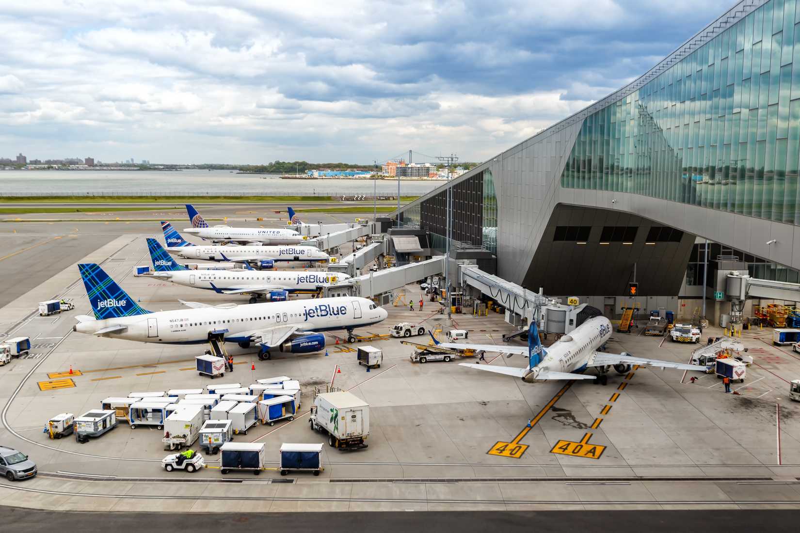 JetBlue airplanes at Terminal B of New York LaGuardia Airport (LGA)