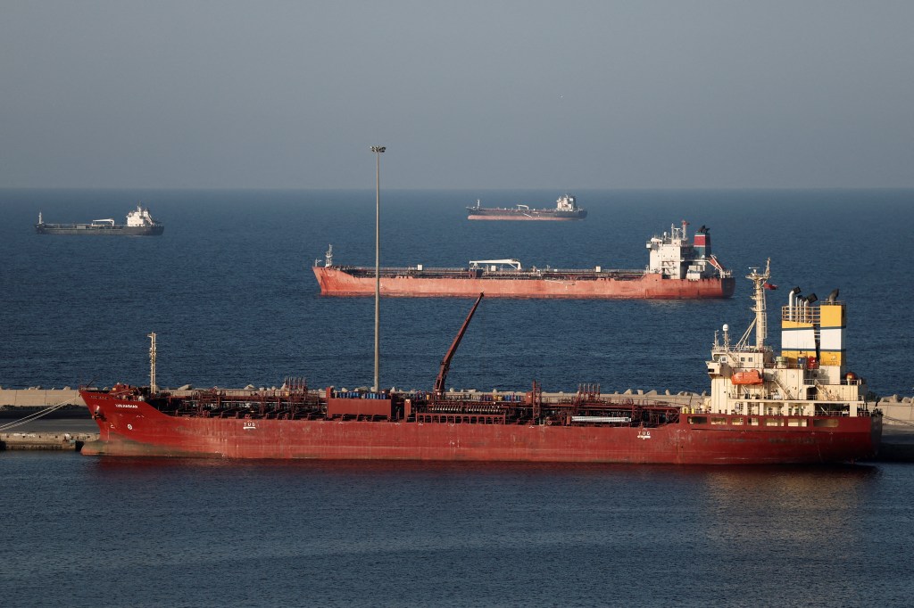 Several tanker ships, including the Luojiashan, anchored in Muscat.