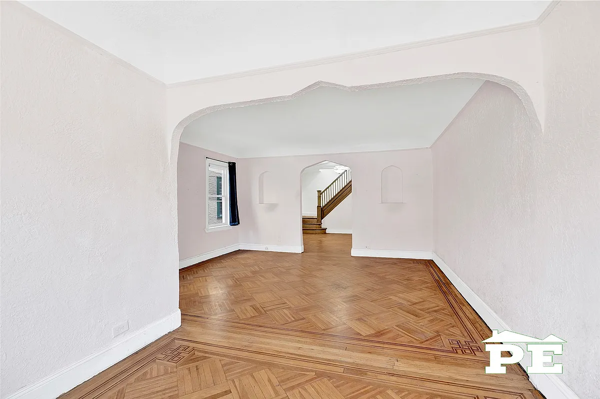 living room with arches, niches