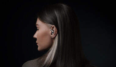 Woman wearing Meze Audio Astru IEM in-ear