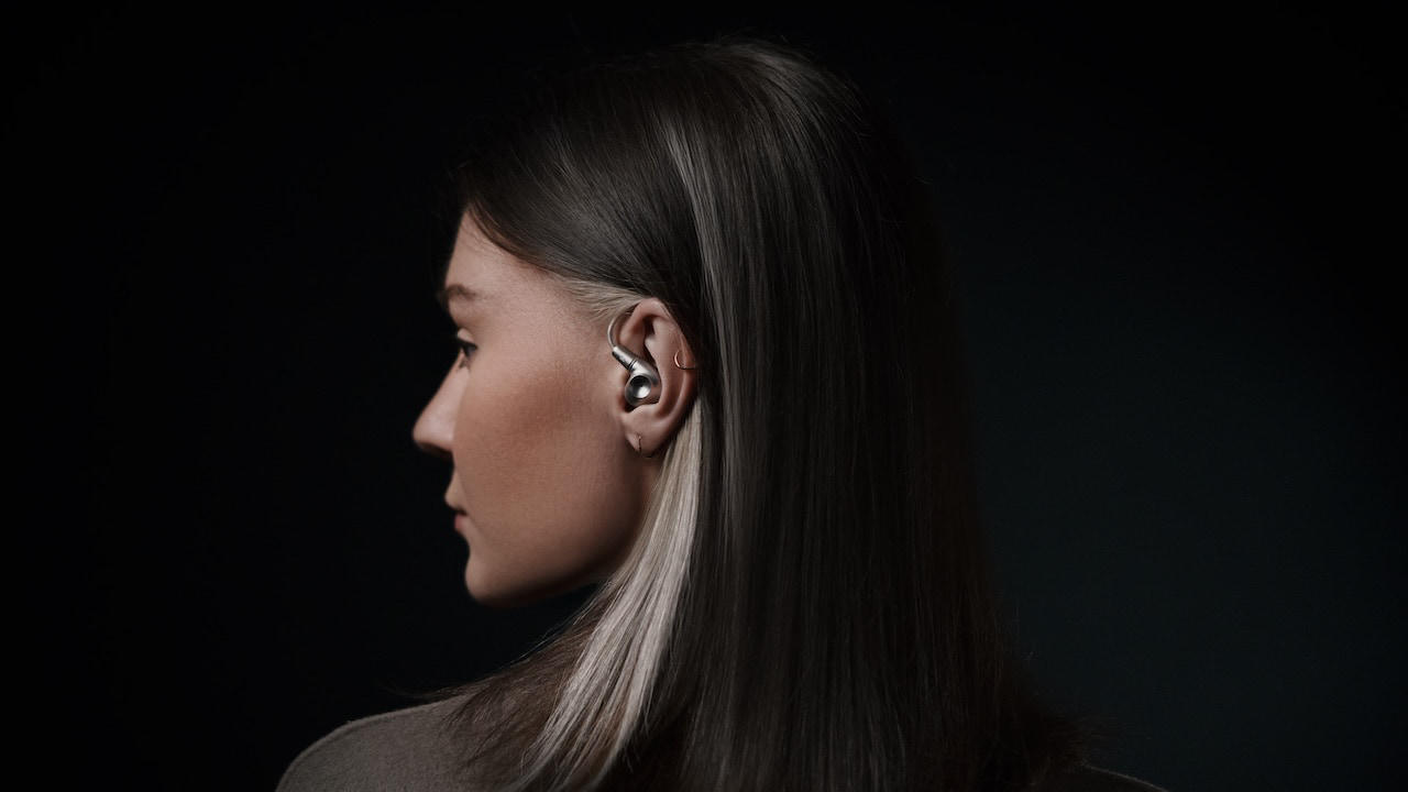 Woman wearing Meze Audio Astru IEM in-ear