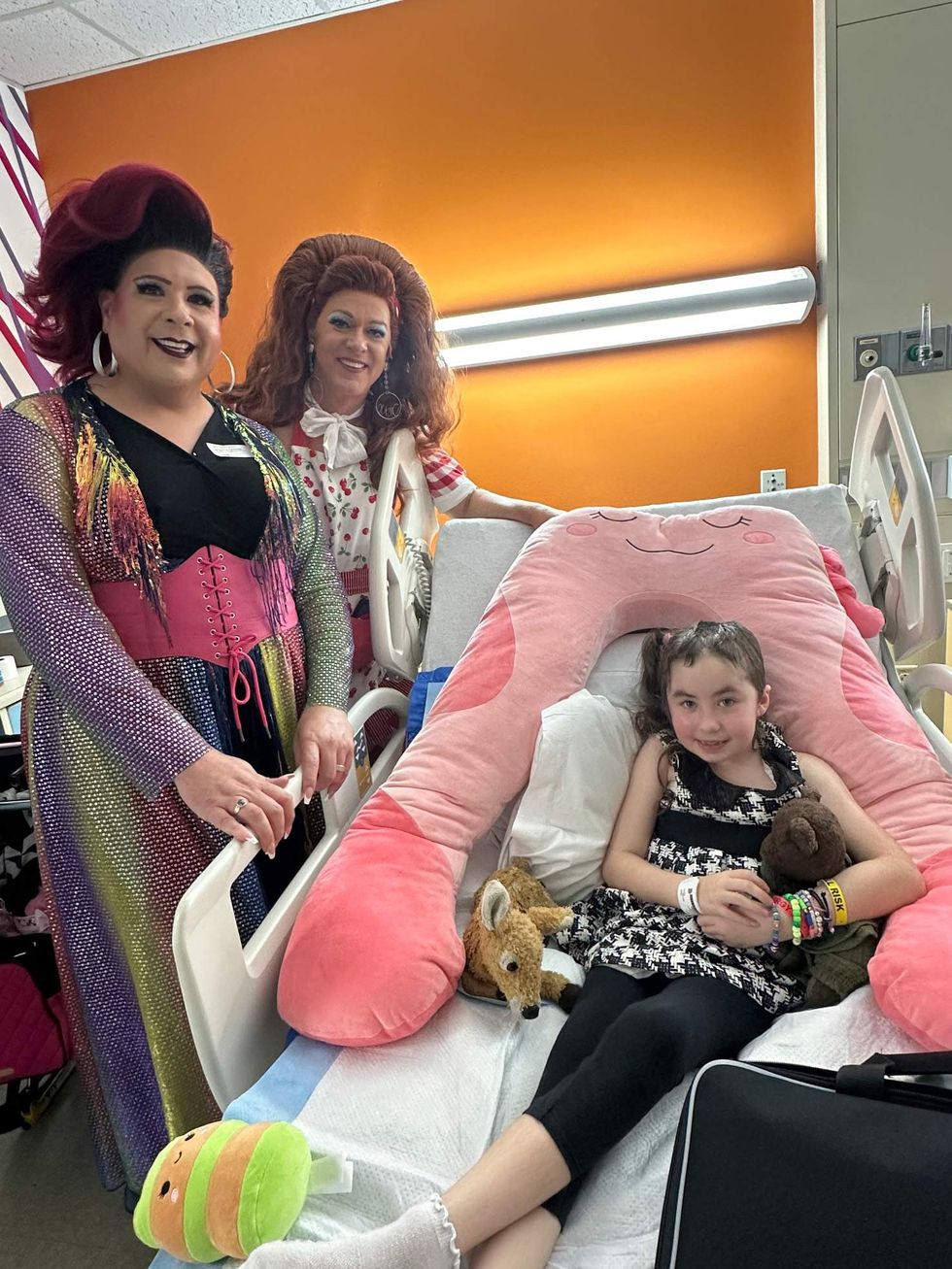 Miss Bouv\u00e8\u00e9 and Dixie Longate with Anwyn Watts.