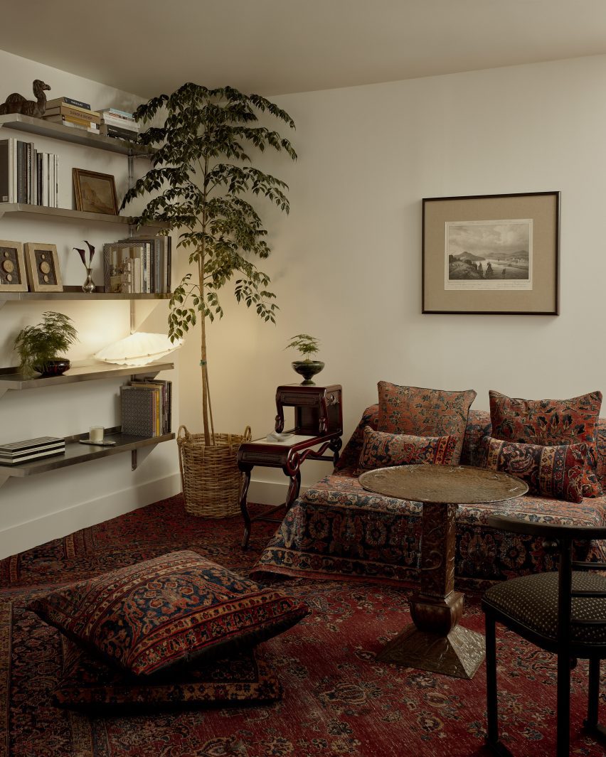 A variety of vintage pieces accompany highly patterned carpets