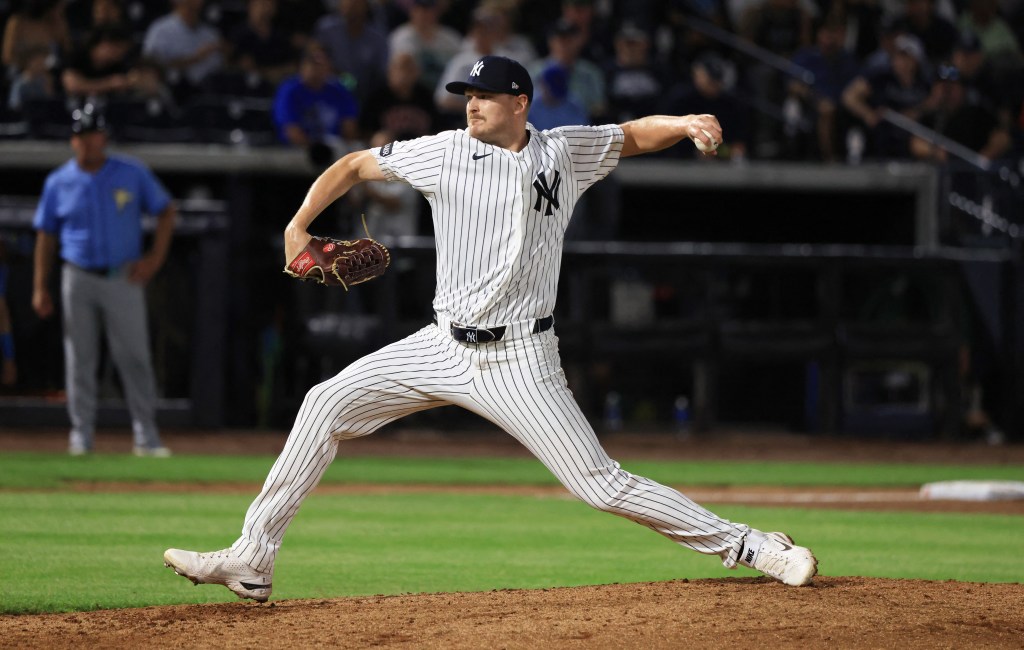 New York Yankees pitcher Brent Headrick (47) throws a pitch.