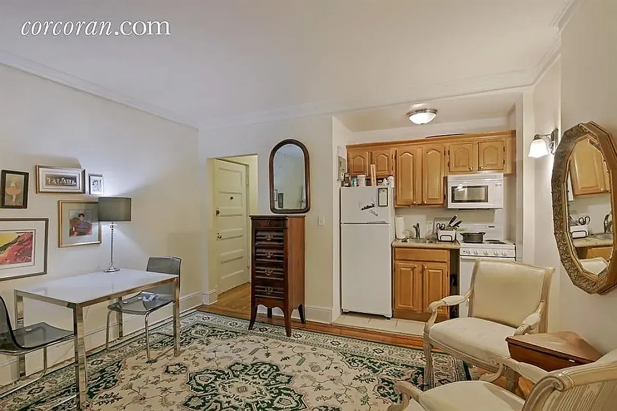 living space with a compact kitchen