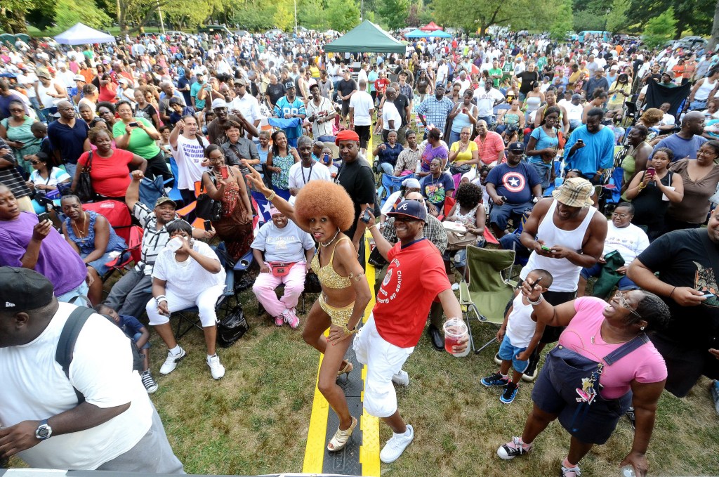 People dance a Summer Stage concert in The Bronx’s Crotona Park