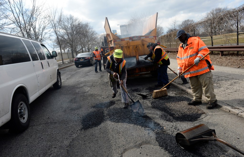 NYC DOT crew repairing potholes along Cropsey Avenue in Brooklyn.