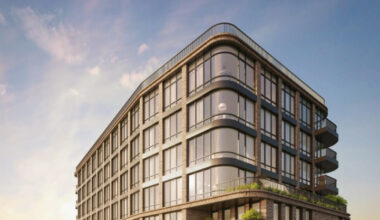 rendering of a multi-story building with terraces