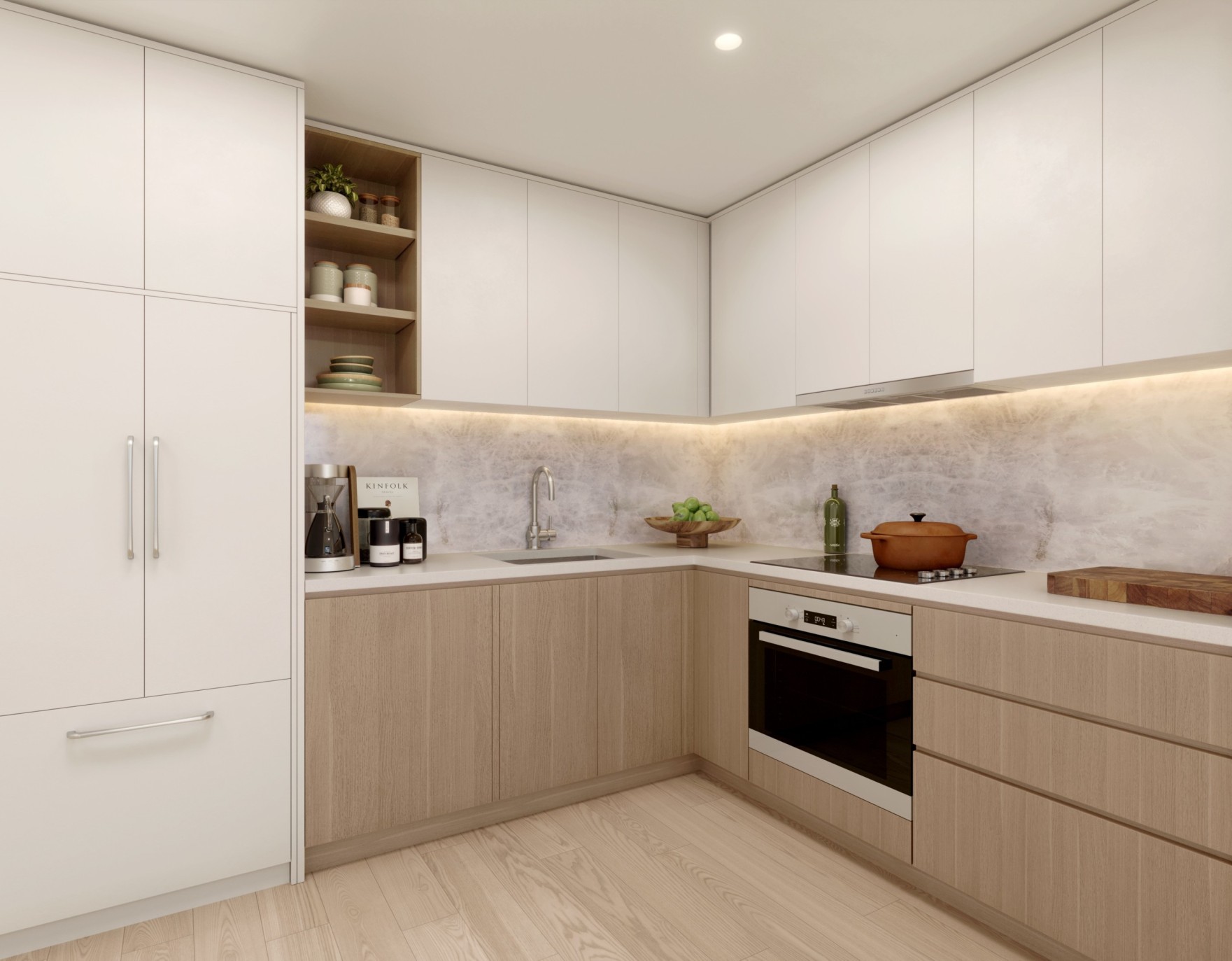 apartment kitchen with slabfront cabinets and electric stovetop