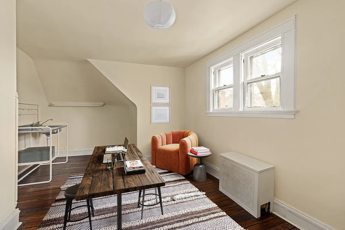 top floor bedroom with a sink