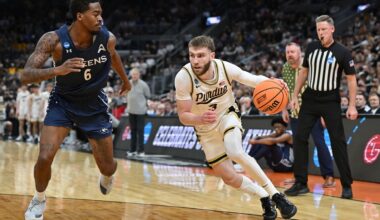 Purdue's Braden Smith (3) drives to the basket past Queens University's Avantae Parker (6) during the first round of the NCAA college basketball tournament Friday, March 20, 2026, in St. Louis. (AP Photo/Ali Overstreet)