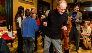 Harvey Weiss, center, dances during a Granpods event at Carter’s in Beacon on Feb. 19. The group organizes social outings for older people to combat social isolation.
