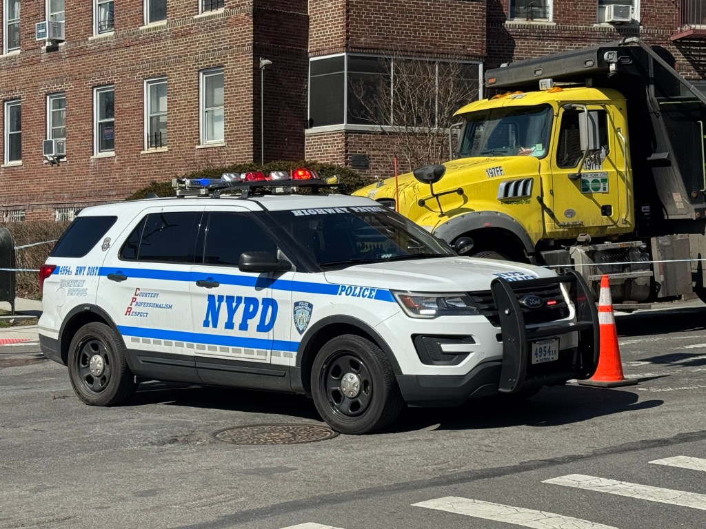 The scene where a woman, believed to be in her 30s, was struck and killed by a DOT dump truck at Metropolitan Avenue and Lefferts Blvd in Queens, Tuesday, March 10, 2026.