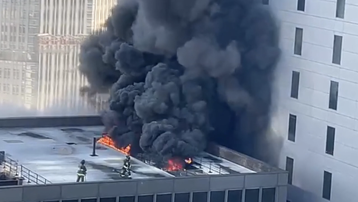 Rooftop fire sends black smoke over Midtown Manhattan near St. Patrick's Day Parade