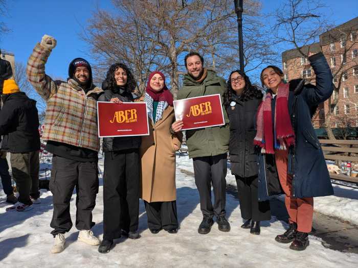 Senate District 12 candidate Aber Kawas with a number of DSA candidates and elected officials at Woodside's Doughboy Plaza last month. Photo via Aber for Senate.