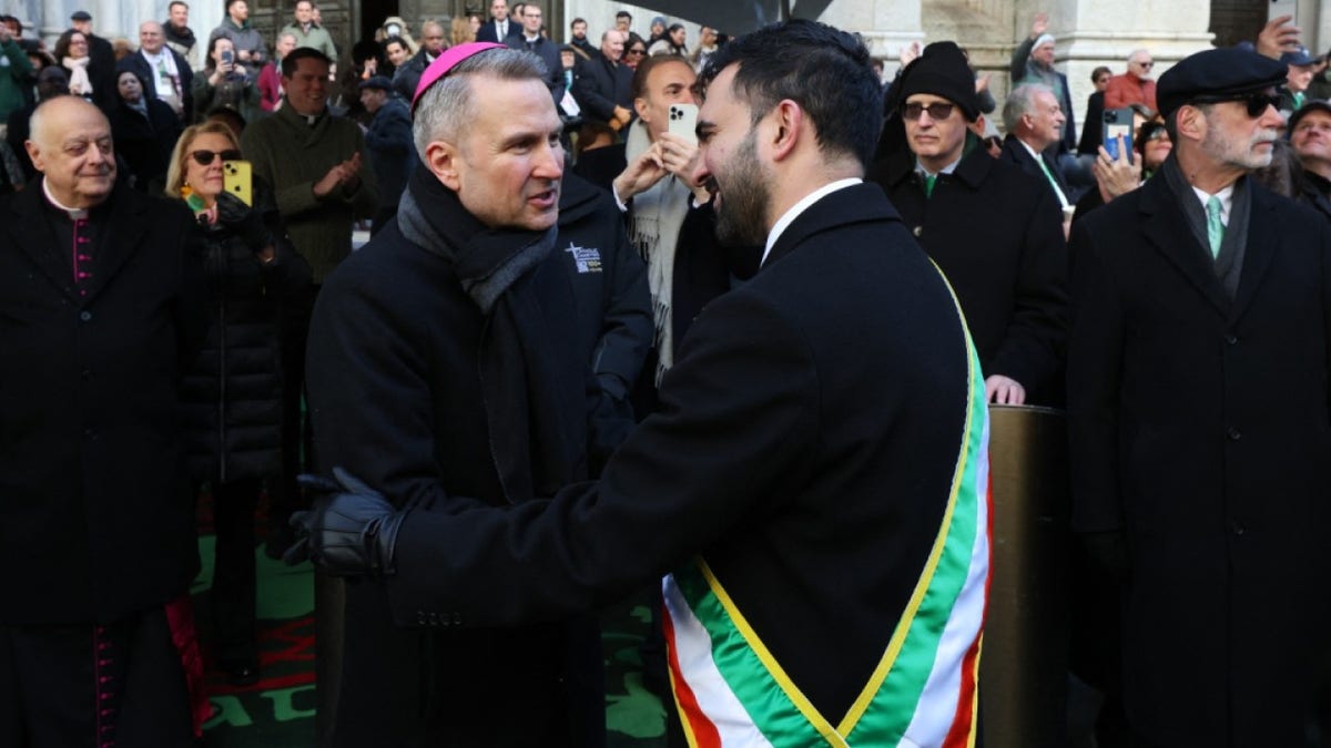 New York City Mayor Zohran Mamdani (R) greets the Archbishop of New York Ronald Hicks during the annual St. Patrick's Day Parade in New York on March 17, 2026.