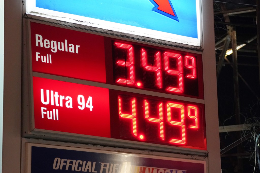 A gas station sign showing prices of $3.49 for regular and $4.49 for Ultra 94.
