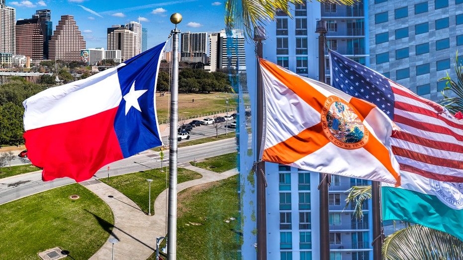 Texas and Florida flags flying in front of buildings
