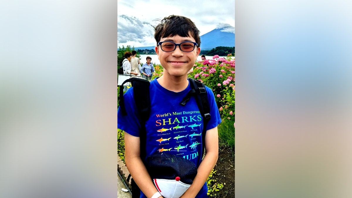 Thomas Medlin smiling and posing for a photo