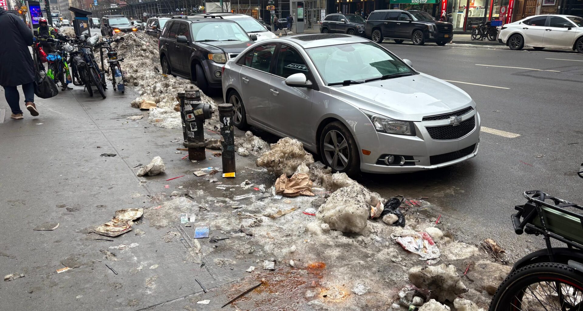 Hell’s Kitchen’s Post-Winter Reality — Litter, Potholes and the Mess Left Behind