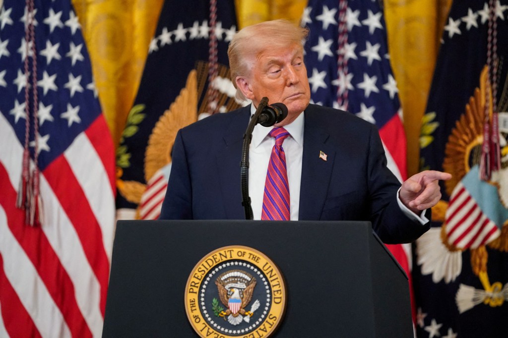 U.S. President Donald Trump speaks before signing the "Genius Act" at the White House.