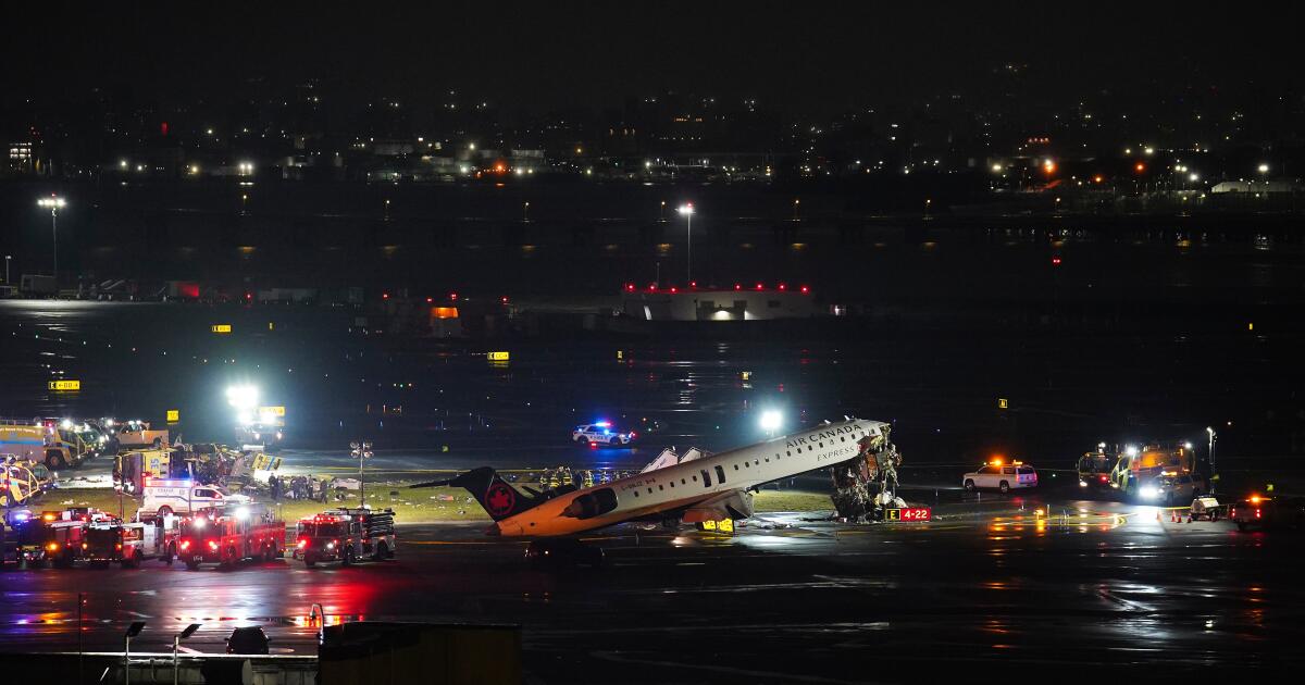 2 pilots killed in collision between jet and fire truck at New York's LaGuardia Airport
