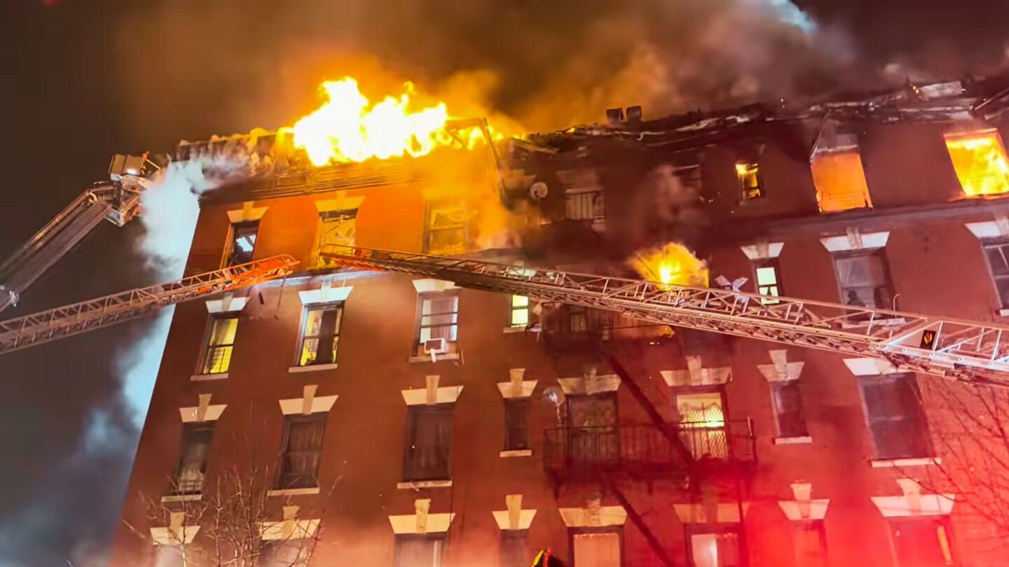 Five-alarm Bronx apartment fire spreads to cockloft, kills man