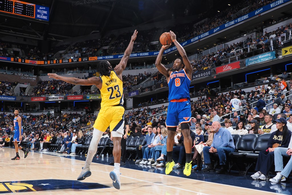 OG Anunoby of the New York Knicks shoots a three-point basket against the Indiana Pacers.