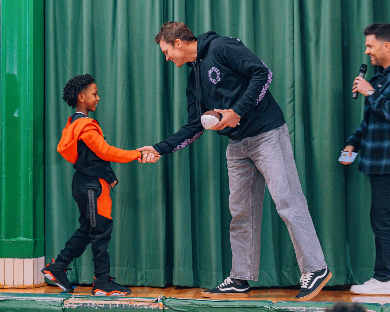 Tom Brady surprises students at Prospect Schools to celebrate his new sports cards store in Brooklyn | Brooklyn Bridge Parents