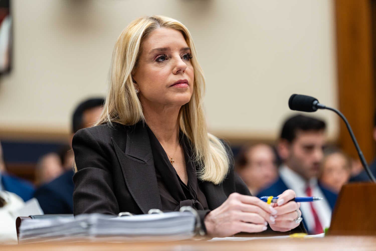 Pam Bondi during a hearing at the Rayburn House Office Building. She’s wearing a black blazer.