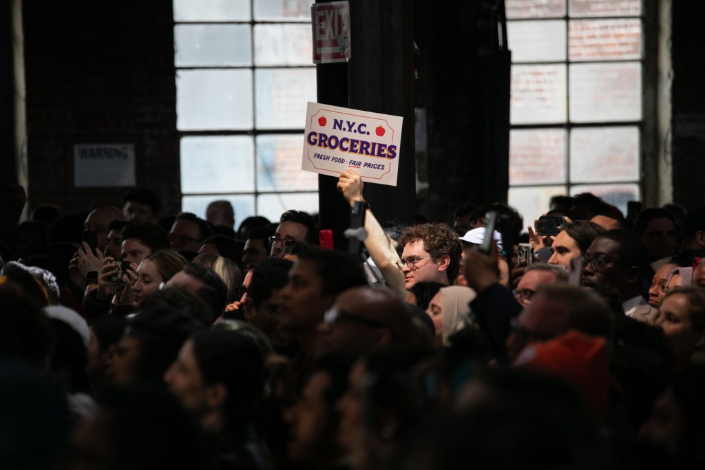 City workers and supporters held signs at the Knockdown Center in Queens marking Mayor Zohran Mamdani’s key priorities like creating city-run grocery stores ahead of Mamdanis address marking his 100 days in office,