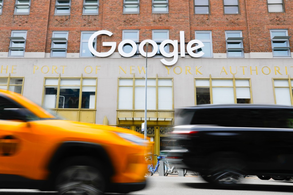 Cabs drive up Eight Avenue in Chelsea past Google’s offices,