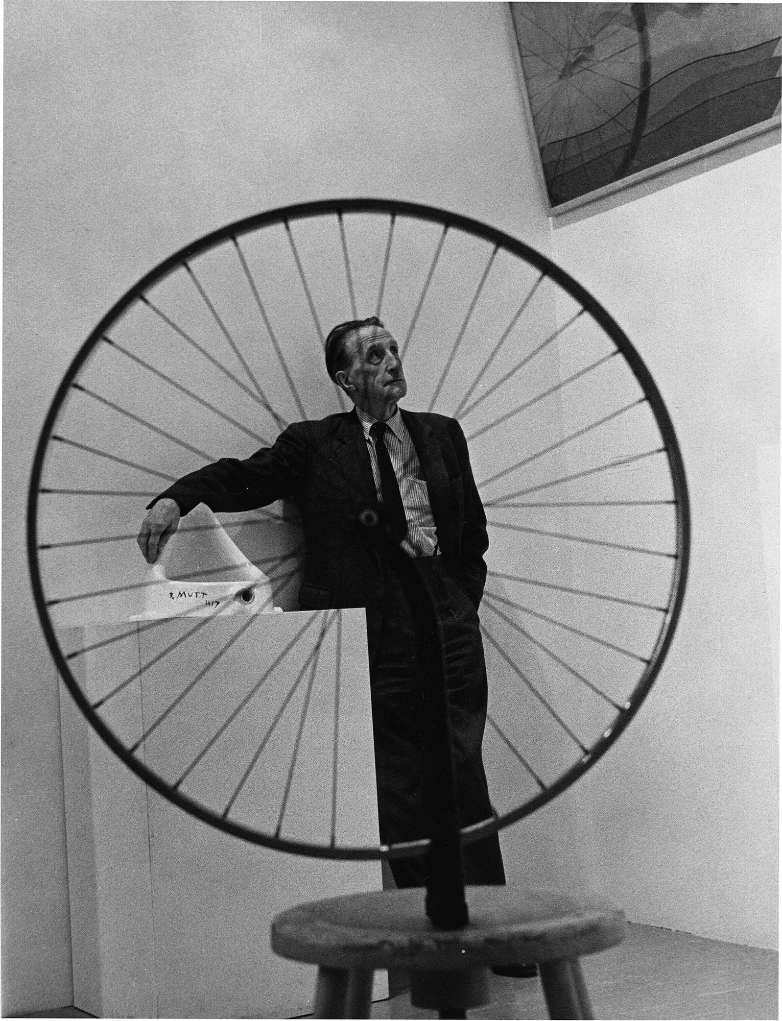 Image may contain Robert Garran Machine Spoke Clothing Coat Photography Wheel Adult Person Face Head and Portrait