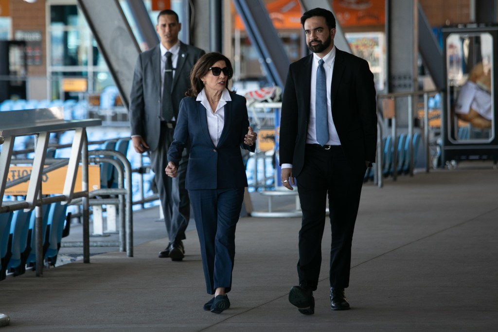 Gov. Kathy Hochul and Mayor Zohran Mamdani walk through Ferry Hawks stadium on Staten Island before a World Cup hosting press conference,