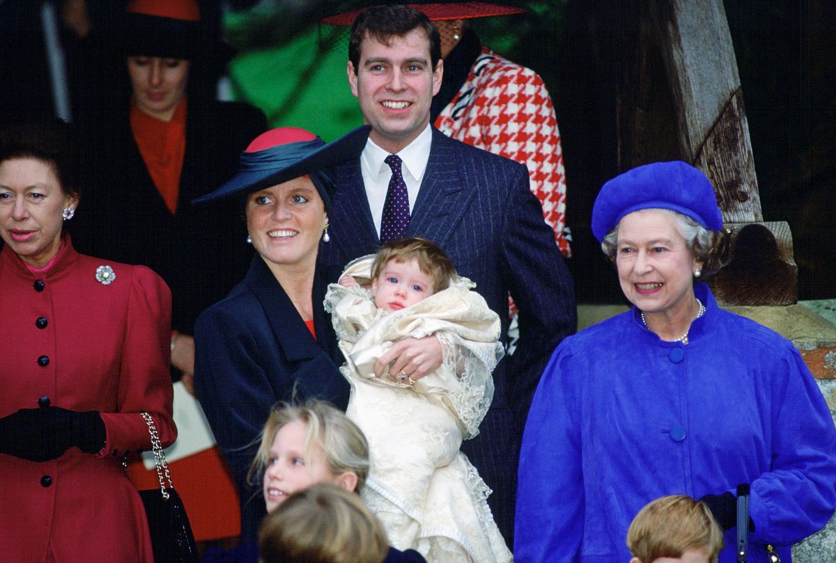SANDRINGHAM, UNITED KINGDOM - DECEMBER 23:  Princess Eugenie's Christening At Sandringham Church. From Left : Princess Margaret, Duchess Of York Holding Princess Eugenie, Prince Andrew And The Queen. In The Front Row Is Zara Phillips.  (Photo by Tim Graham Photo Library via Getty Images)