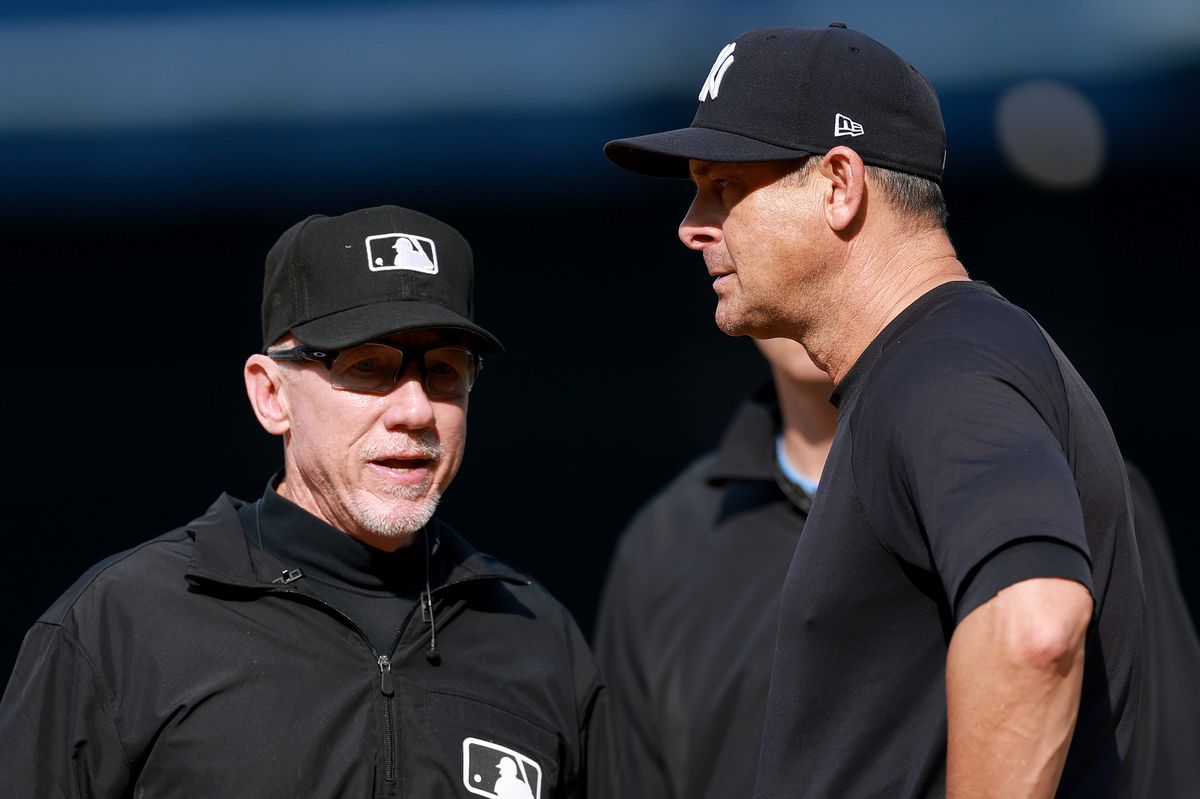 Aaron Boone was ejected from Thursday's contest for arguing a balk call