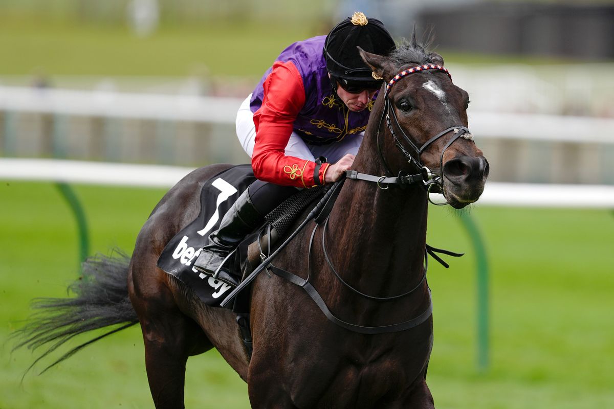 Ryan Moore riding Portcullis win The Betway Wood Ditton Maiden Stakes at Newmarket