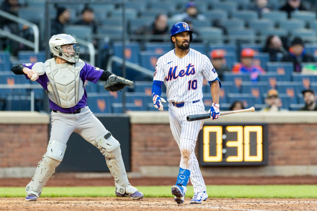 Marcus Semien (10) reacts after striking out during the seventh inning against the Colorado Rockies at Citi Field, Sunday, April 26, 2026, in Queens, NY. 