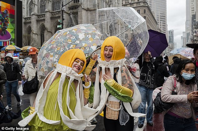 While the 2026 Easter Parade was dampened by gray skies and rain, the streets were none the less brightened by everyone's outfits - some even incorporated umbrellas into their look
