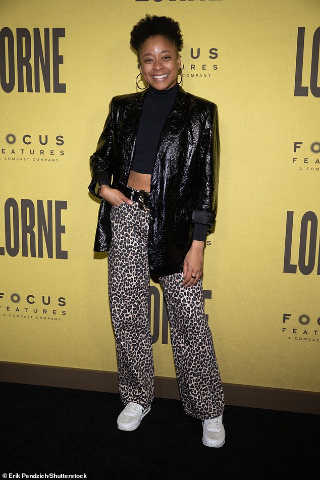 2 Dope Queens star Phoebe Robinson flashed her toned abs in a black crop top and leopard-print pants